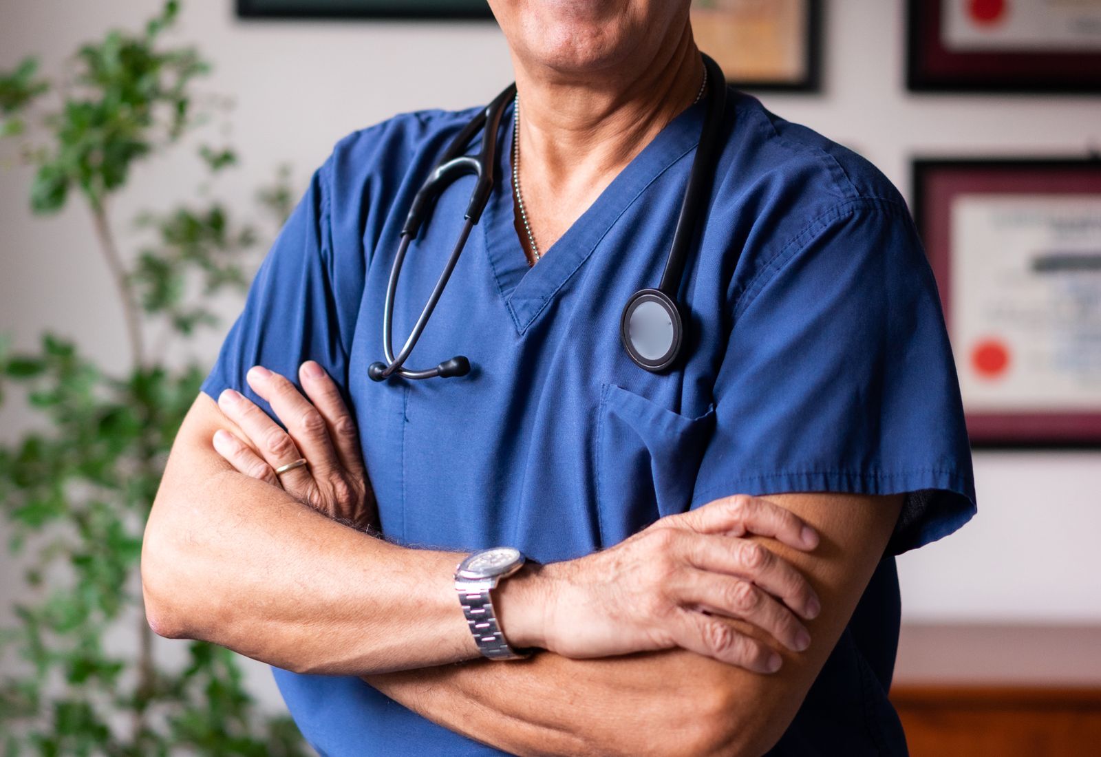 A diverse team of licensed medical providers standing together